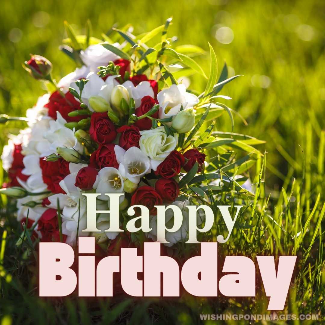 Bouquet of red and white roses flowers on the grass - Happy Birthday Flower Images